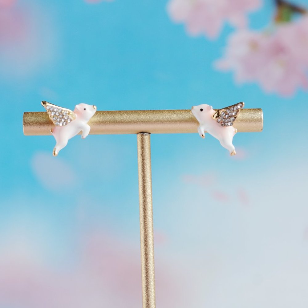 Bill skinner flying pig earrings